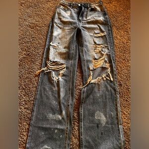 Distressed wide leg high rise jeans